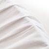 Détail de notre drap housse 100 % coton percale 32x72